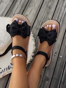 Sandali flat con fiocco decorativo e punta aperta per donna, moda estiva casual da festa e ufficio, in raso nero