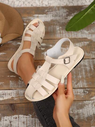 新款手工编织复古猪笔款女士平底凉鞋，时尚百搭，适合夏季