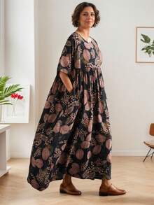 Đầm đi biển phong cách Bohemian mới năm 2026, cổ tròn, in hoa, dáng rộng, kiểu dáng xòe, cỡ lớn, màu đen thanh lịch. - màu đen - Xem 9