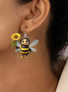 1 par de aretes creativos y lindos de abeja de acrílico sosteniendo un girasol, diseño de animal encantador como regalo para mujeres
