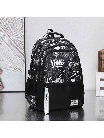 男女通用迷彩背包，大容量书包，中小学生笔记本电脑包，时尚休闲旅行背包，多隔层设计（所有肩带字母随机）