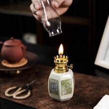 1pc Ceramic Plum, Orchid, Bamboo, Chrysanthemum Oil Lamp, Adjustable Wick Camping Fuel Lamp, Ceramic Candlestick For Altar, Desktop Decor Lamp, Indoor Ceramic Oil Lamp, Oil Lamp/Hurricane Lamp With Flame Control Knob, Celebration Lamp, Retro Metal Appearance, No Power Supply Required.