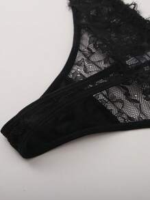 Conjunto de lencería con cierre delantero, camiseta sin acolchado de encaje y tanga de encaje a la cadera