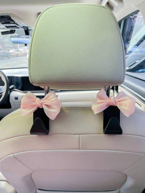 Gancio appendiabiti carino con fiocco per sedile auto, accessori interni creativi per auto