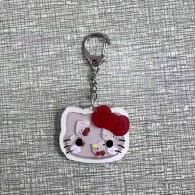 Sanrio 1 pieza Llavero con gatito de dibujos animados que se mueve, dije adorable de gato para mochilas y bolsos, regalo perfecto para cumpleaños, Pascua, accesorios adorables (estilo aleatorio)