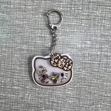 Sanrio 1 pieza Llavero con gatito de dibujos animados que se mueve, dije adorable de gato para mochilas y bolsos, regalo perfecto para cumpleaños, Pascua, accesorios adorables (estilo aleatorio)