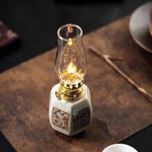 1pc Ceramic Plum, Orchid, Bamboo, Chrysanthemum Oil Lamp, Adjustable Wick Camping Fuel Lamp, Ceramic Candlestick For Altar, Desktop Decor Lamp, Indoor Ceramic Oil Lamp, Oil Lamp/Hurricane Lamp With Flame Control Knob, Celebration Lamp, Retro Metal Appearance, No Power Supply Required.