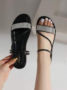 Sandalias planas de mujer con cristales, modelo de moda simple 2025