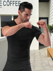 1 pieza Camiseta deportiva de manga corta y cuello redondo, de unicolor, transpirable, para hombres, talla grande, adecuada para correr, ir al gimnasio, ciclismo - Negro - Ver 5