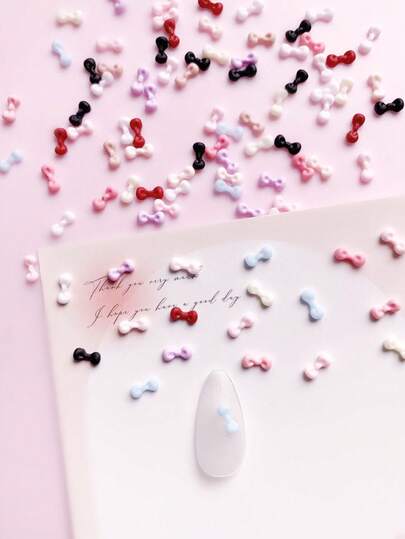 100 piezas de estilo de primavera y verano, mini lazos de colores caramelo, diseño de lazo de tamaño pequeño, decoración de arte de uñas, decoración de uñas pequeña de lazo estilo japonés DIY, decoración de arte de uñas, suministros de uñas de múltiples colores mezclados al azar