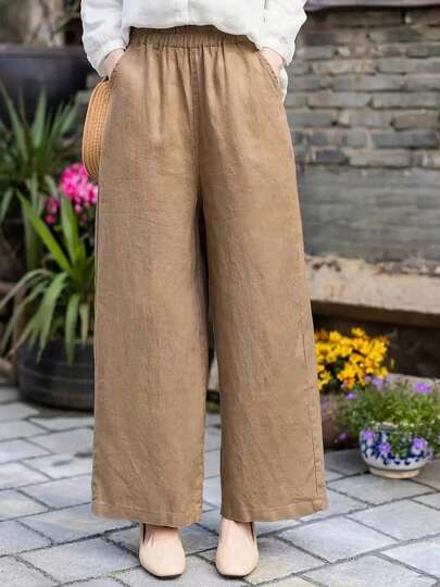Pantalones casuales de pierna ancha con bolsillos y cintura elástica de unicolor para mujer