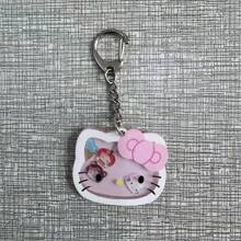 Sanrio 1 pieza Llavero con gatito de dibujos animados que se mueve, dije adorable de gato para mochilas y bolsos, regalo perfecto para cumpleaños, Pascua, accesorios adorables (estilo aleatorio)