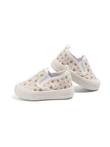 1 par de zapatillas casuales cómodas y planas con estampado de corazón en color beige, aptas para uso diario, escuela, todas las estaciones (patrón enviado al azar)
