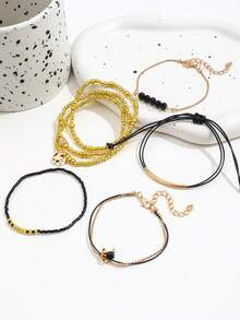 7 件时尚心形串珠手链，可调节 CCB 仿水晶和米珠编织手链，适合女士