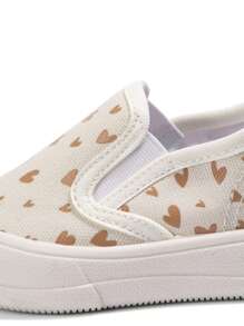 1 par de zapatillas casuales cómodas y planas con estampado de corazón en color beige, aptas para uso diario, escuela, todas las estaciones (patrón enviado al azar)