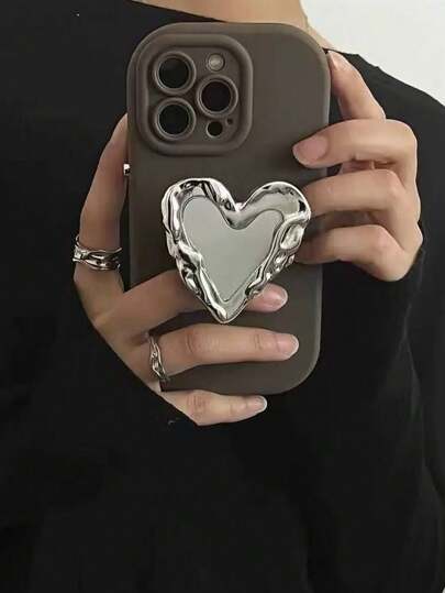 1pc Heart-Shaped Mirror Airbag Phone Holder Grip, Electroplated Bright Silver Creative Cool Style Niche High Aesthetic Ins Style, Portable Touch Up Tool, Comfortable Desktop Holder With Retractable Push-Pull Feel, Back Sticker+Holder Two In One Use, Both Good-Looking And Practical, Preferred For Selfies And Videos, With No Trace Or Residue On The Sticker, Can Be Matched With Different Color Phone Cases, Suitable For Almost All Phones