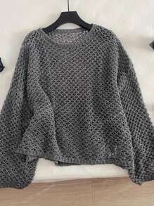 Pull lâche en tricot ajouré pour les vacances d'été