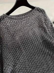 Pull lâche en tricot ajouré pour les vacances d'été