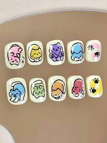 24片短款棺材形压制假指甲贴片，可爱卡通涂鸦甜美炫彩法式儿童美甲贴片，搭配1片果冻胶和1片磨砂条，适合儿童派对、舞蹈、日常休闲佩戴，可拆卸可重复使用。 - 彩色 - 查看 1