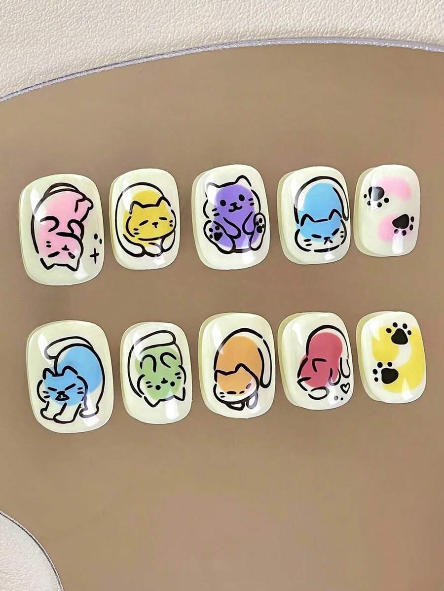 24片短款棺材形压制假指甲贴片,可爱卡通涂鸦甜美炫彩法式儿童美甲贴片,搭配1片果冻胶和1片磨砂条,适合儿童派对、舞蹈、日常休闲佩戴,可拆卸可重复使用。 - 彩色 - 查看 1