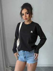 Camiseta de manga larga bordada con estampado de dibujos animados - Negro - Ver 1