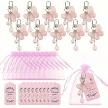 36 件/12 套粉色蝴蝶吊坠钥匙扣，包括 12 个钥匙扣 + 12 个粉色欧根纱袋 + 12 张感谢卡，适合生日派对、婚礼礼物、包包装饰以及度假归来的小礼物