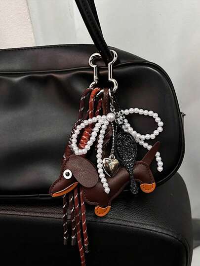 Yogodlns سلسلة مفاتيح على شكل كلب سوسيس مكان سحبات بطراز INS مع ديكور عقدة وشريط رباط مناسب للفتيات/السيدات للعمل/المدرسة كهدية صغيرة لها لزيادة جاذبيتك، تصميم ثنائي الجانب مع الفيونكات