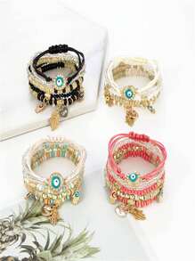 Set de 4 pulseras de estilo bohemio con cuentas acrílicas de ojo malvado y corazón, adecuadas para uso diario de mujeres