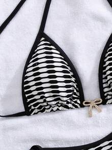 Nowe wiosenno-letnie kontrastowe czarno-białe bikini z metalowym motylem, seksowny strój kąpielowy