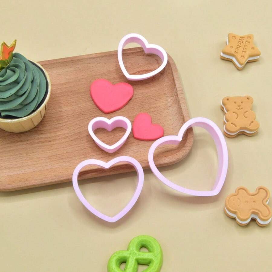 4 piezas Cortadores de plástico con forma de corazón para hornear galletas, moldes para decorar pasteles y fondant - Rosa - Ver 1