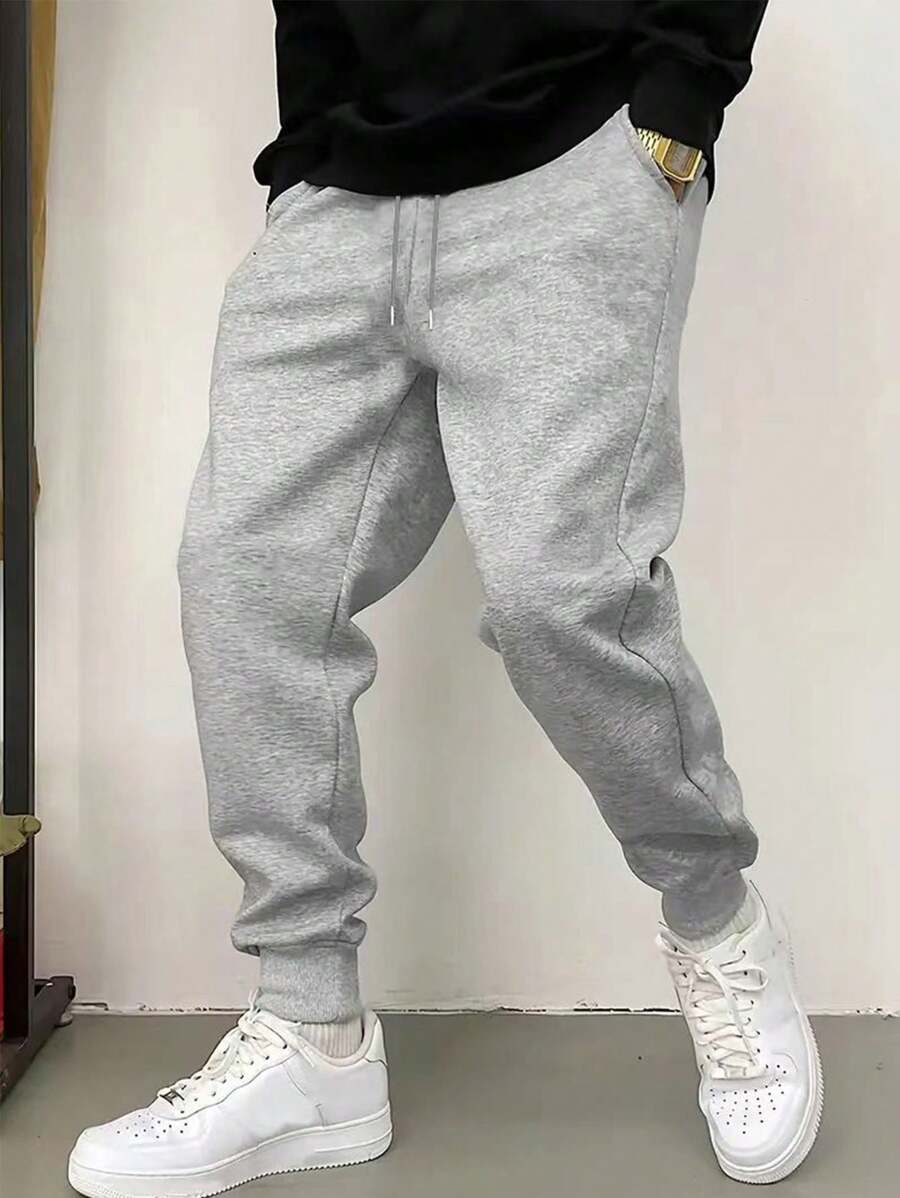 Pantalon de survêtement confortable à coupe ample pour hommes - Pantalon de sport noir, poches douces, style boyfriend, taille élastique avec cordon, couleurs unies pour toutes les saisons, port décontracté, relaxation et activités de plein air, pantalon de survêtement léger pour l'entraînement, la course, la salle de gym, l'exercice