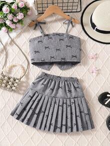 2 件套少女韩版蝴蝶结吊带背心 + 百褶裙套装，灰色优雅设计，精美蝴蝶结印花，适合休闲、校园、演出、夏季外出，展现甜美高端造型