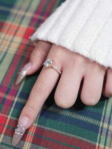 1 件 2 克拉优雅椭圆形切割莫桑石钻石订婚戒指 | 玫瑰金戒指 | 经典四爪镶嵌，镶嵌闪亮点缀宝石 | 非常适合婚礼、求婚和情人节礼物