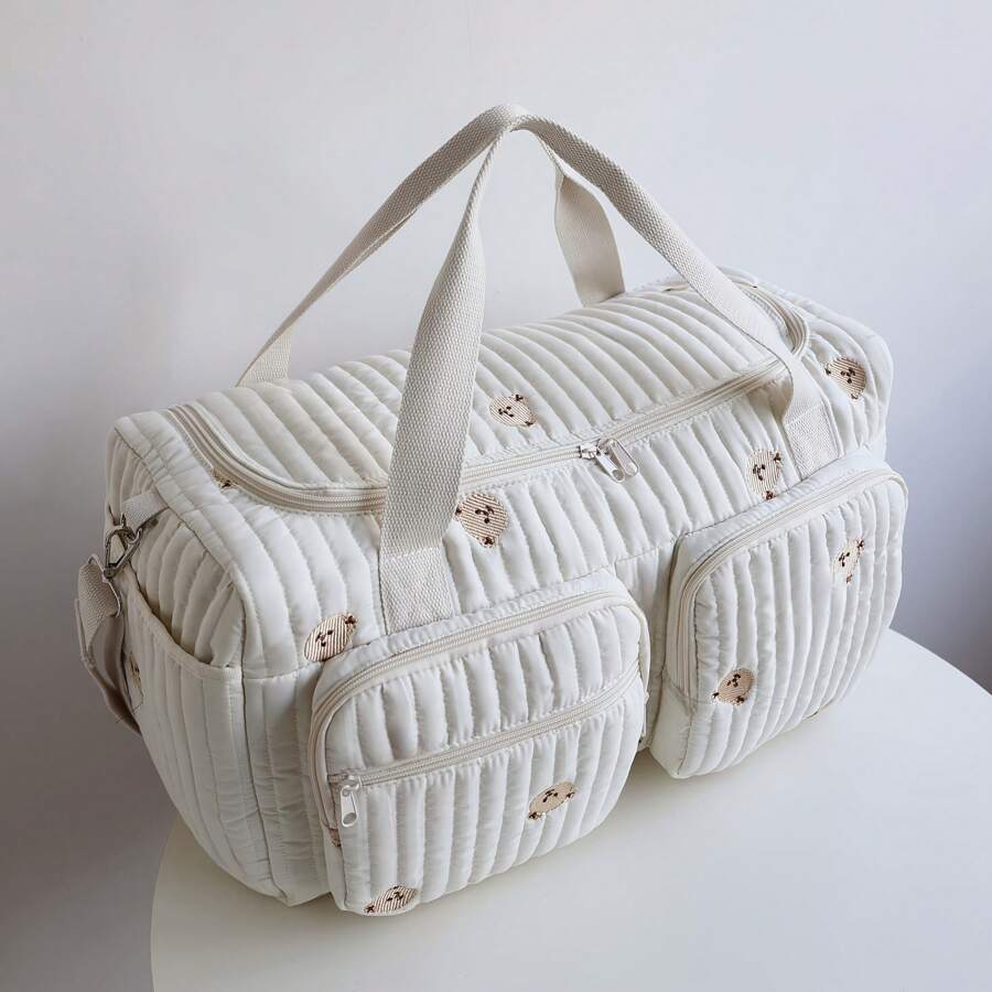 2025 Neue koreanische Mode Mama Wickeltasche mit großer Kapazität, geeignet für Väter; Mehrfachtaschenentwurf mit funktionalen Fächern für verschiedene Babysachen; Reißverschluss-Klappendeckel für einfachen Zugriff auf Kleidung & Zubehör; verziert mit niedlichem Bären-Patch, der der Tasche einen lustigen Akzent verleiht für Schule Zubehör Schulsachen