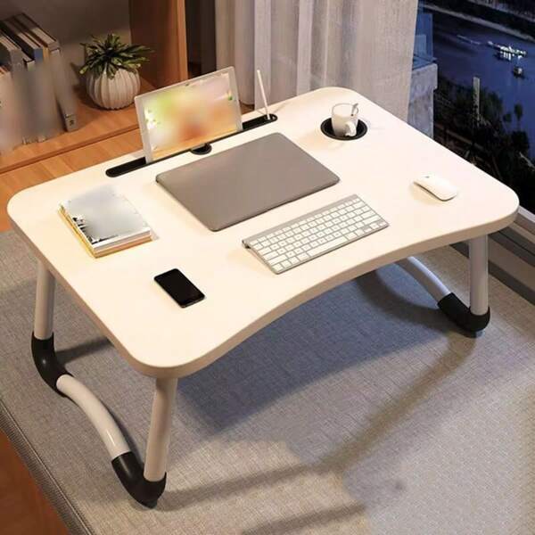 This Is A Foldable Leisure Table. Its Size Is 60*40*28cm And Can Be Used As A Laptop Table Or A Study Table. It Is Available In Several Colors And Also Has A Cup Holder And Card Slots. It Is Sturdy And Reliable, No Assembly Required, And Easy To Use. It Saves Space And Is Perfect For Working From Home. It Can Also Be Used In Bedrooms, Living Rooms, And Outdoor Camping. (We Are Currently Unable To Deliver To Remote Areas)