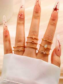 FUNEIA 8PCS/Set 14K Gold Plated Stackable Rings - Dainty Cubic Zirconia Heart & Plain Band Stacking Rings For Women, Non-Tarnish Everyday Jewelry Gift - Rose Gold - View 1