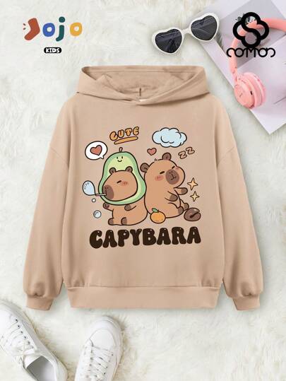 Novidades para a primavera! Meninas algodão ombro caído confortável Curve oversize primavera e outono casual versátil moletom com capuz solto estilo universitário de rua roupas infantis drapeado macio manga longa nova série moletom, desenho animado bonito capivara dormindo, abacate, arte carta padrão impressão top