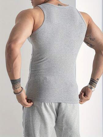 Camiseta de tirantes de punto grueso estilo estadounidense vintage, tipo compresión para fitness, de algodón elástico acanalado. Chaleco sin mangas de ajuste slim para hombre, nuevo, para entrenamiento, de verano.