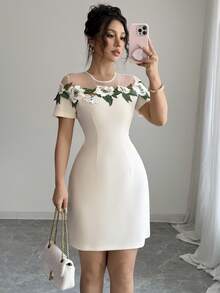 A Short, Form-Fitting Dress With A New Summer Cutout Collar And Embroidered Flowers