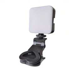 Un dispositivo de iluminación portátil con clip para teléfonos, portátiles y tabletas - Brillo ajustable para videoconferencias, transmisión en vivo, llamadas de Zoom, maquillaje y fotografía - Diseño compacto y elegante en negro con rotación de 180°, fabricado en material PP duradero