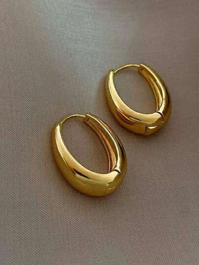 1 par de aretes tipo aros geométricos ovalados con acabado metálico pulido, accesorio de pendientes de estilo retro para mujeres