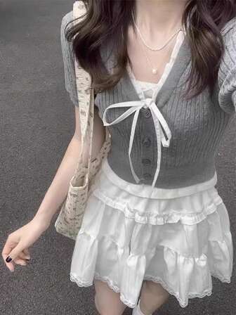 独特设计 V 领系带短袖针织短款上衣，甜美迷人春夏