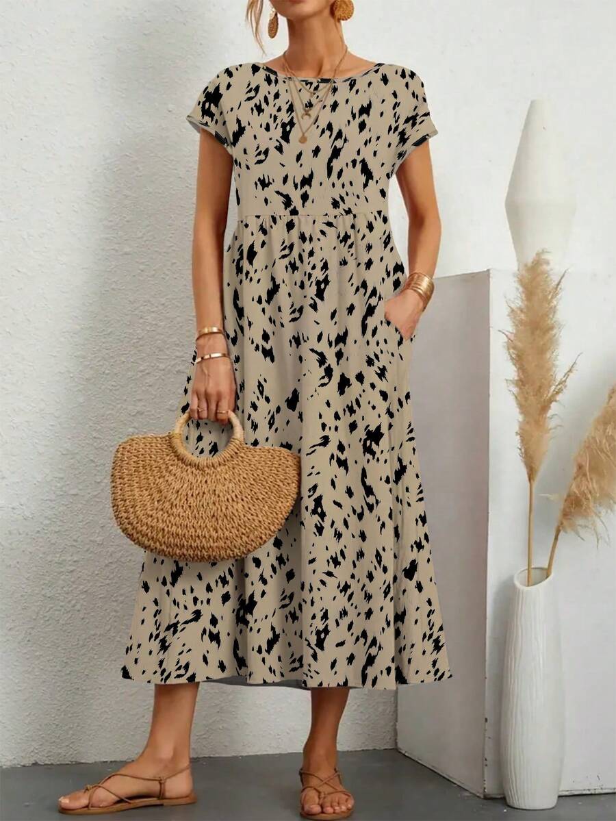 女士春夏全身印花复古梭织面料中长连衣裙适合海滩或度假。