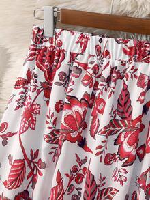 女士高腰飘逸蓝色印花半身裙，修身百搭