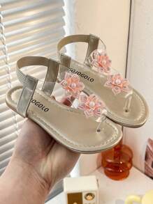 1 par de sandalias planas para niños con diseño de flor grande, estilo princesa de moda y suela antideslizante, en color amarillo. Sandalias abiertas de verano para niños de 3 a 12 años, para interior y exterior, de vacaciones