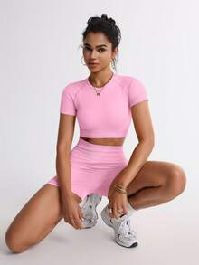 TCVC Bộ đồ thể thao nữ không đường may, màu trơn, áo croptop tay ngắn cổ tròn + quần short cạp cao, chất liệu co giãn, ôm sát, thoáng khí, thích hợp cho chạy bộ, yoga, tập gym, hoạt động ngoài trời và thời gian thư giãn mùa hè. - Hồng - Xem 6