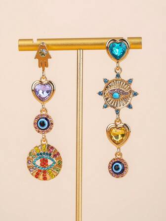 1 对女士耳环，采用优雅的金色金属制成，镶嵌多色宝石和经典的魔鬼眼设计，点缀闪亮的水钻，打造奢华外观