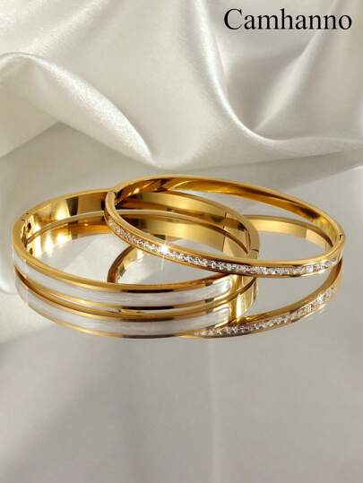 سواران من الفولاذ المقاوم للصدأ العصري المزين بأحجار الراين وقطرات الزيت، مثالي للمهرجانات والاحتفالات، لا يتلاشى