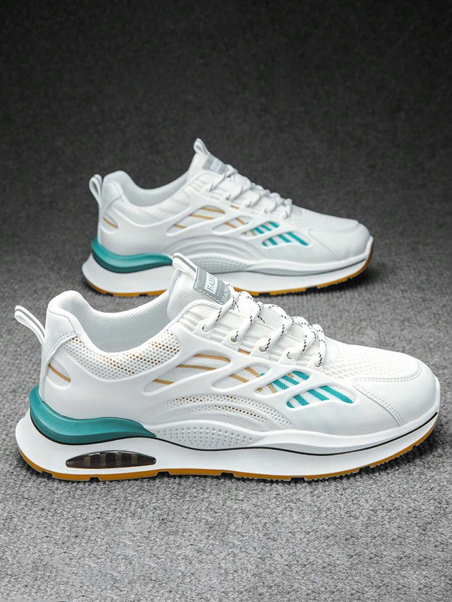 极光白色运动鞋,搭配翡翠绿色流线型饰边 + 金色标志 | 空气动力学网布 + 云泡缓冲技术 | 防滑锯齿外底,适合健身房/城市探险 | - 凉爽通风和抗菌鞋垫,2000 年代风格 - 彩色 - 查看 1