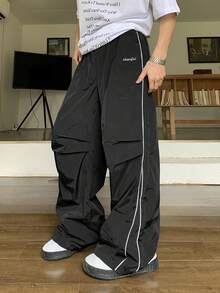 Men's Loose Straight-Leg Pants With Side Stripe Design - Available In A Variety Of Colors. They Are Stylish And Casual, Breathable And Comfortable. - màu đen - Xem 3